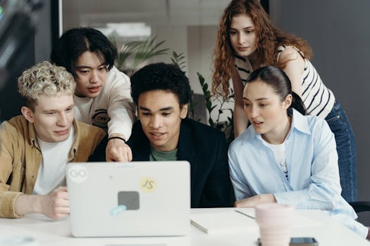 Image of a diverse group of tech professionals collaborating