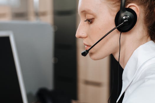 A tech support representative assisting a freelancer via video call