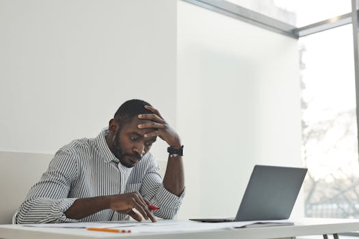 Freelancer working hard at their desk, planning their next big project