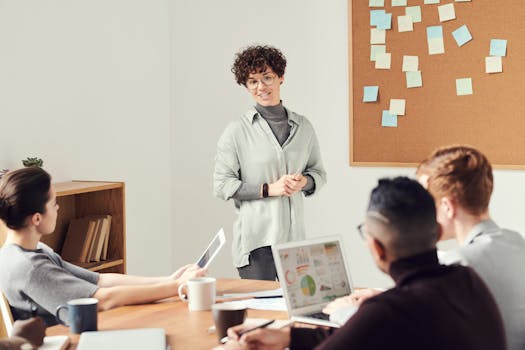 IT manager discussing strategy with the team