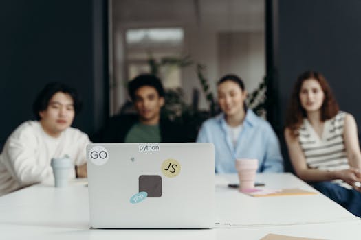 a group of tech professionals engaged in a workshop